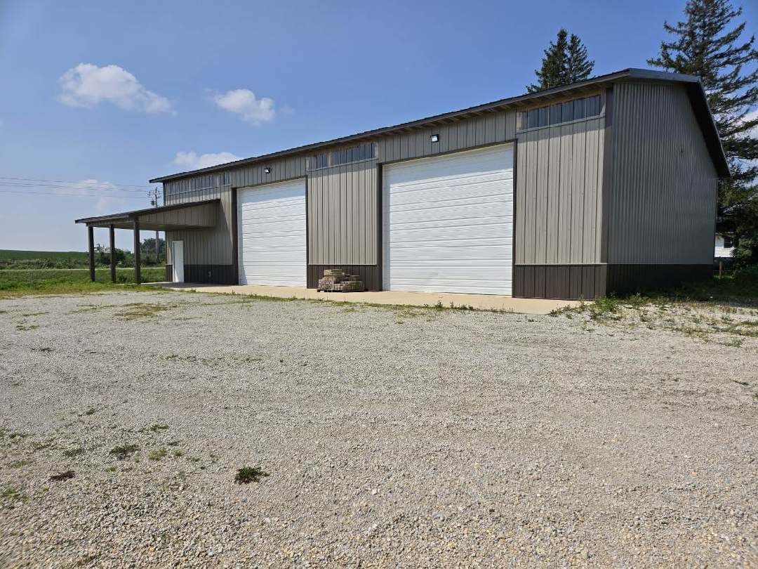 utility/machine shed constructed in 2021
dimensions: 54' x 72' x 16'
concrete floors, 14' garage doors